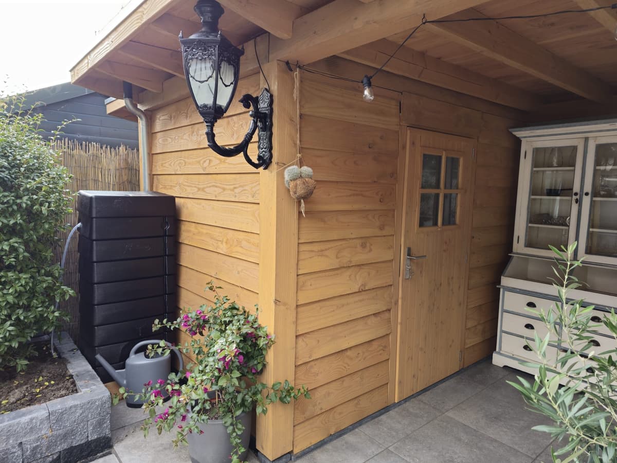 Complete tuinrealisatie met overkapping